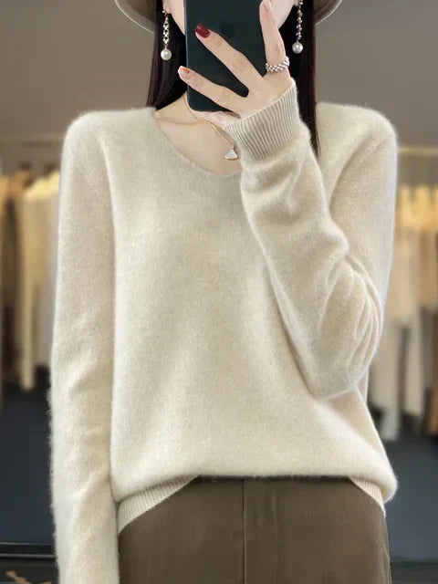 Suéter feminino manga comprida, design folgado V-neck, essencial para conforto e estilo casual.