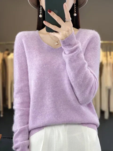 Jumper feminino folgado, gola V, manga comprida, ideal para um estilo descontraído e elegante.