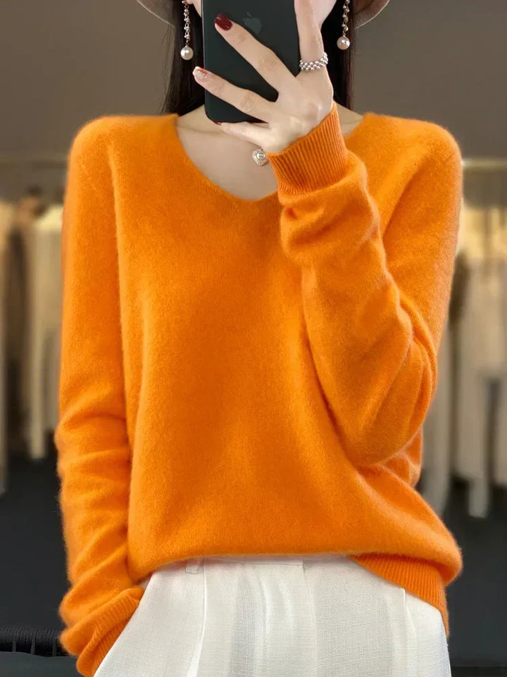 Suéter V-neck feminino, manga comprida e caimento folgado, estilo casual elegante primavera/verão.