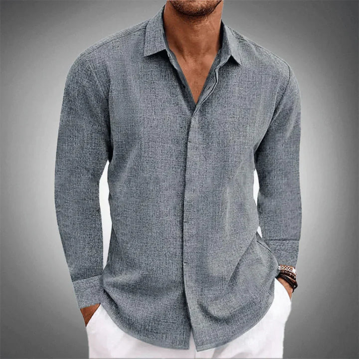 Roupa masculina: camisa de linho de manga longa, botões e gola clássica, perfeita para conforto e sofisticação.