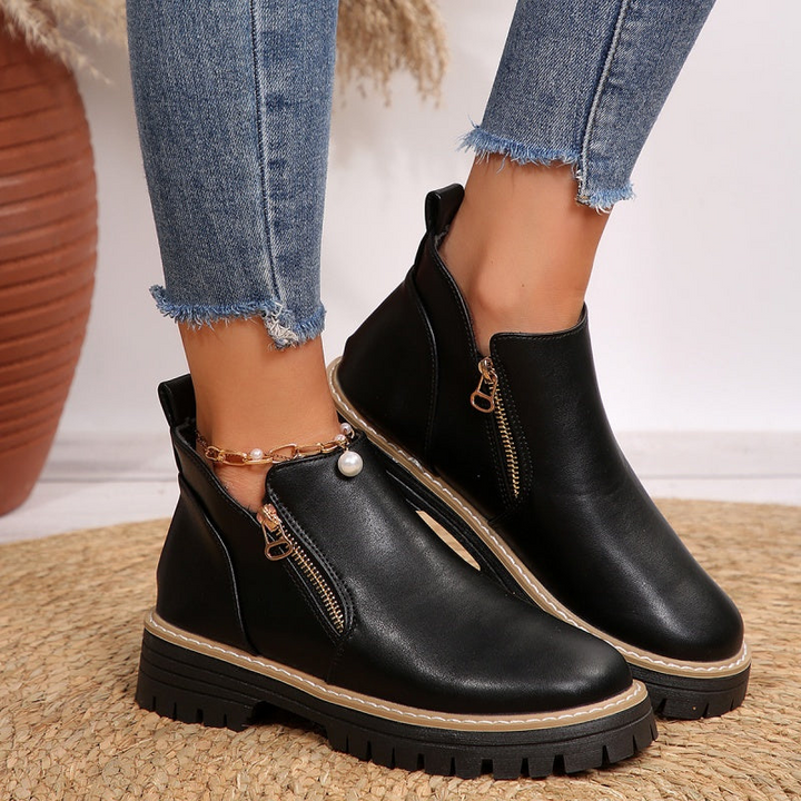 Botas femininas de tornozelo pretas com suporte confortável, calçado antiderrapante para inverno e elegância.
