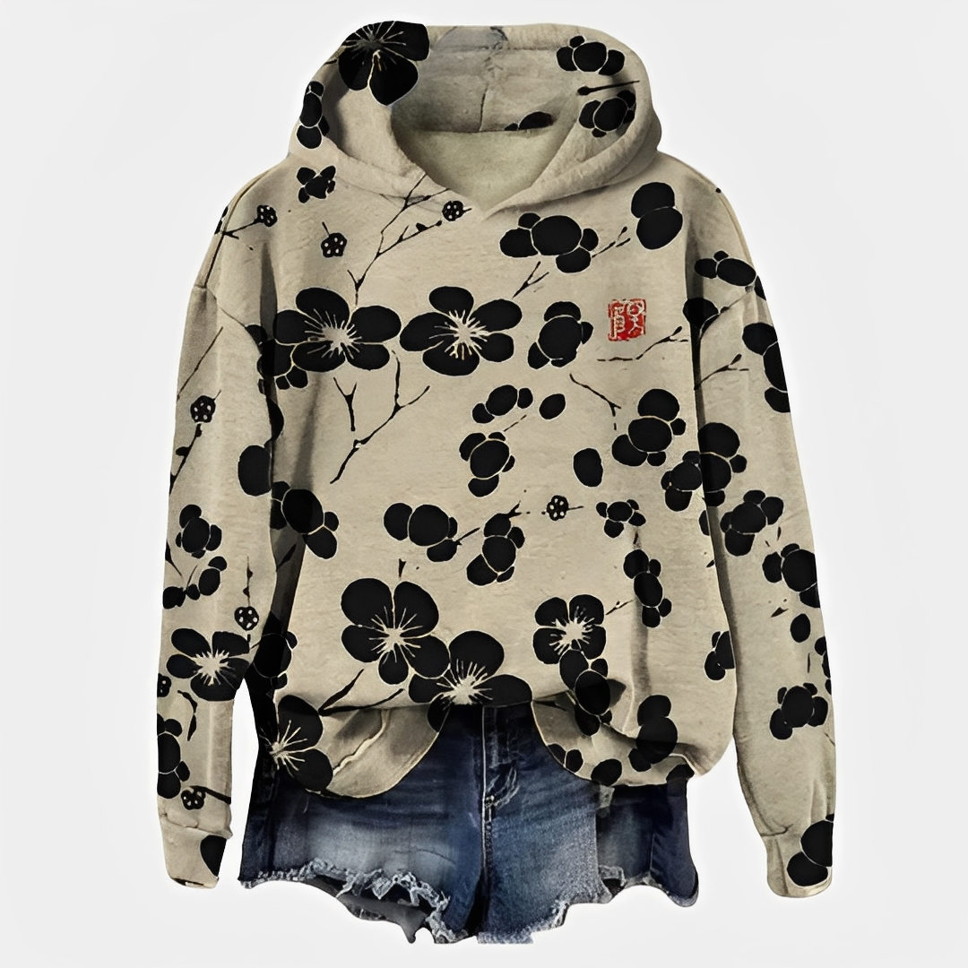 Moletom feminino elegante com capuz floral, ideal para moda outono/inverno. Conforto e estilo casual versátil.