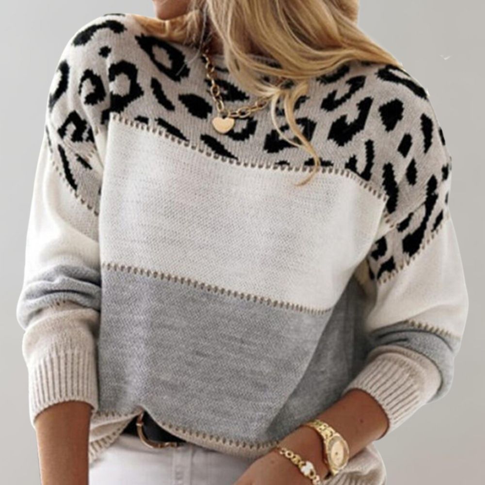 Suéter de oncinha feminino versátil, ideal para looks casuais ou sofisticados. Conforto e estilo outono/inverno.