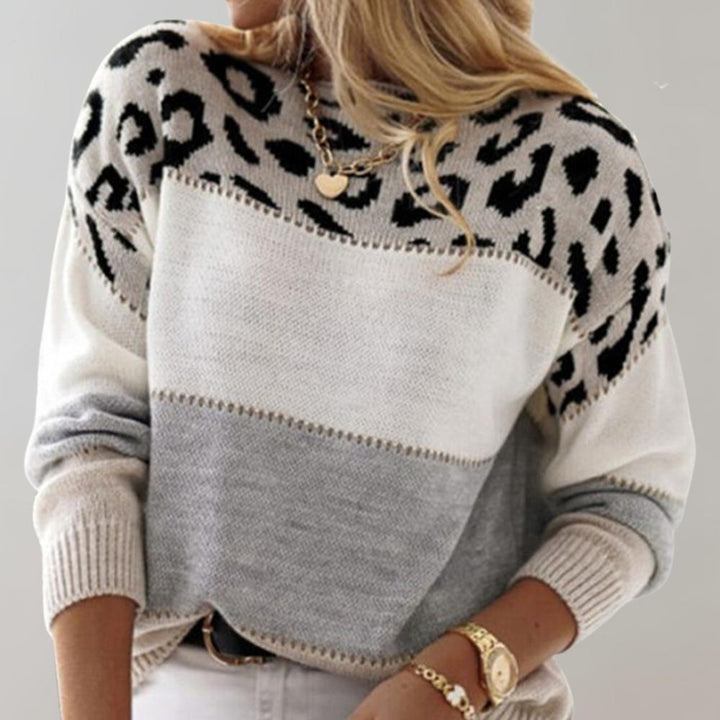 Suéter de oncinha feminino versátil, ideal para looks casuais ou sofisticados. Conforto e estilo outono/inverno.