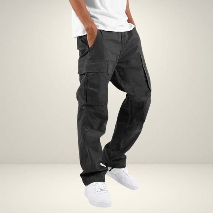 Calças cargo masculinas duráveis, cor neutra, com múltiplos bolsos práticos. Ideal para estilo casual e streetwear.