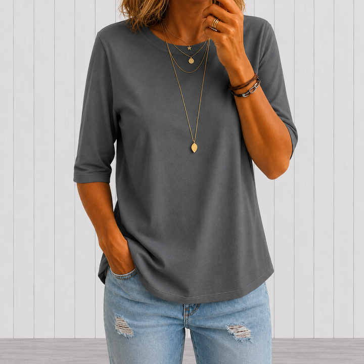 Camiseta feminina de meia manga, descontraída para o dia a dia. Conforto e estilo casual. Perfeita para o verão.