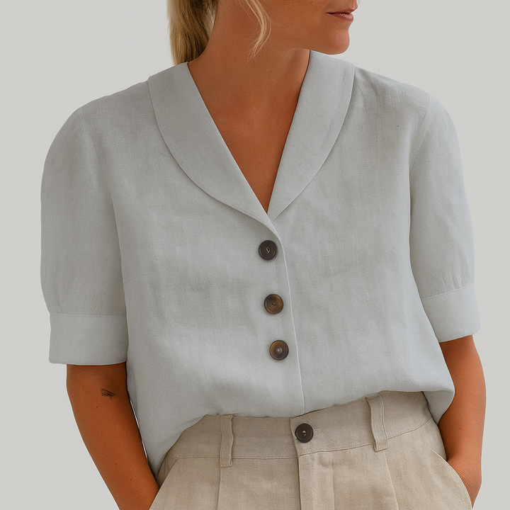 Blusa feminina leve Camille, ideal para o verão. Peça elegante e confortável para moda casual. Disponível em branco, preto, cinza.