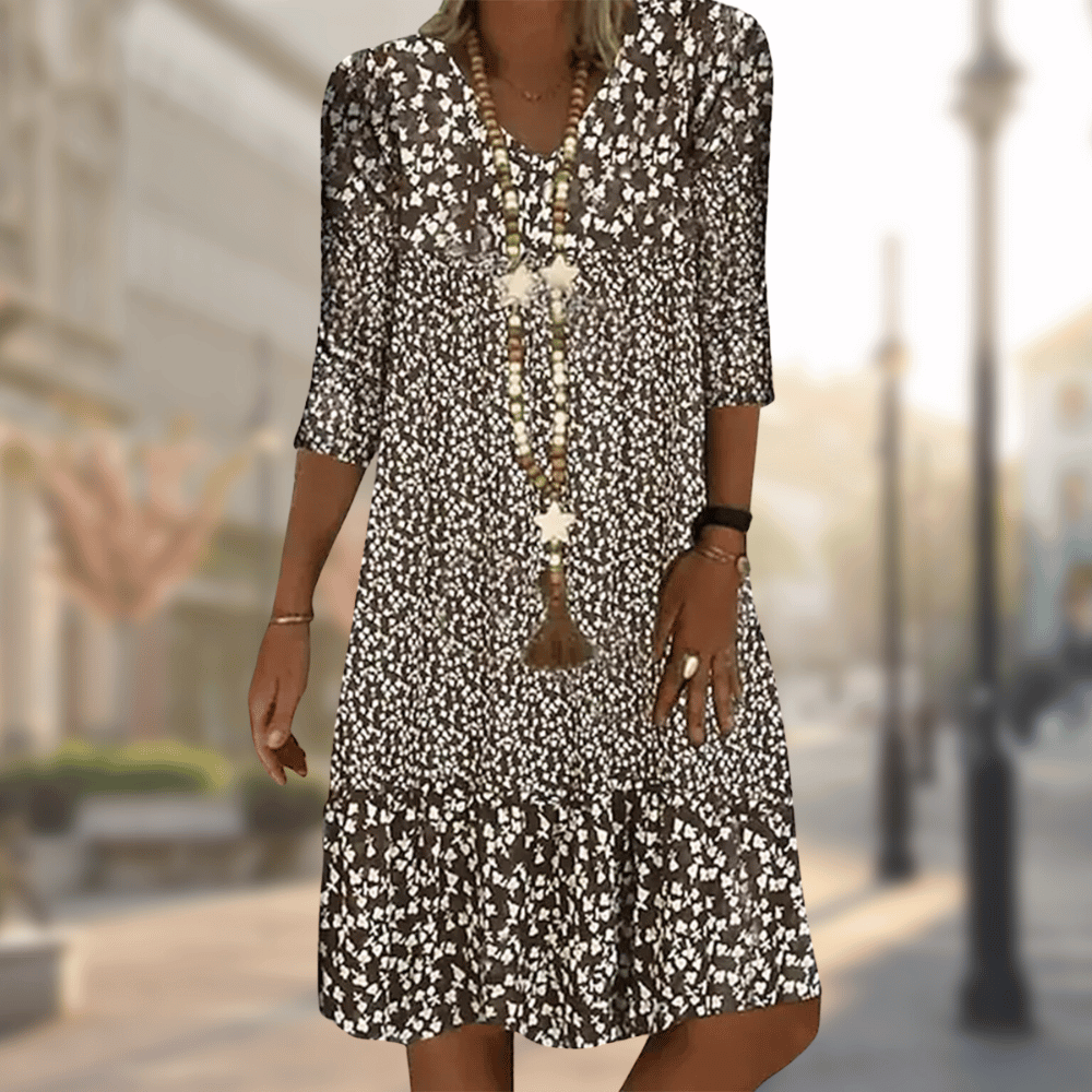 Vestido midi feminino floral vibrante com decote V, estampa primavera verão. Conforto e estilo para o dia a dia.