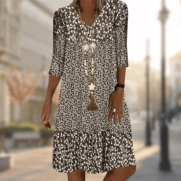 Vestido midi feminino floral vibrante com decote V, estampa primavera verão. Conforto e estilo para o dia a dia.