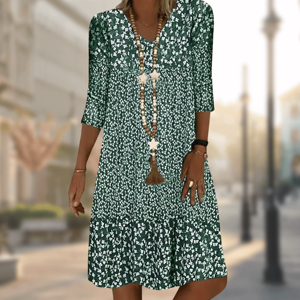 Vestido feminino midi floral decote V, um toque de elegância e versatilidade. Peça chave para moda primavera verão.