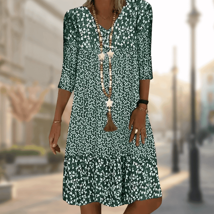 Vestido feminino midi floral decote V, um toque de elegância e versatilidade. Peça chave para moda primavera verão.