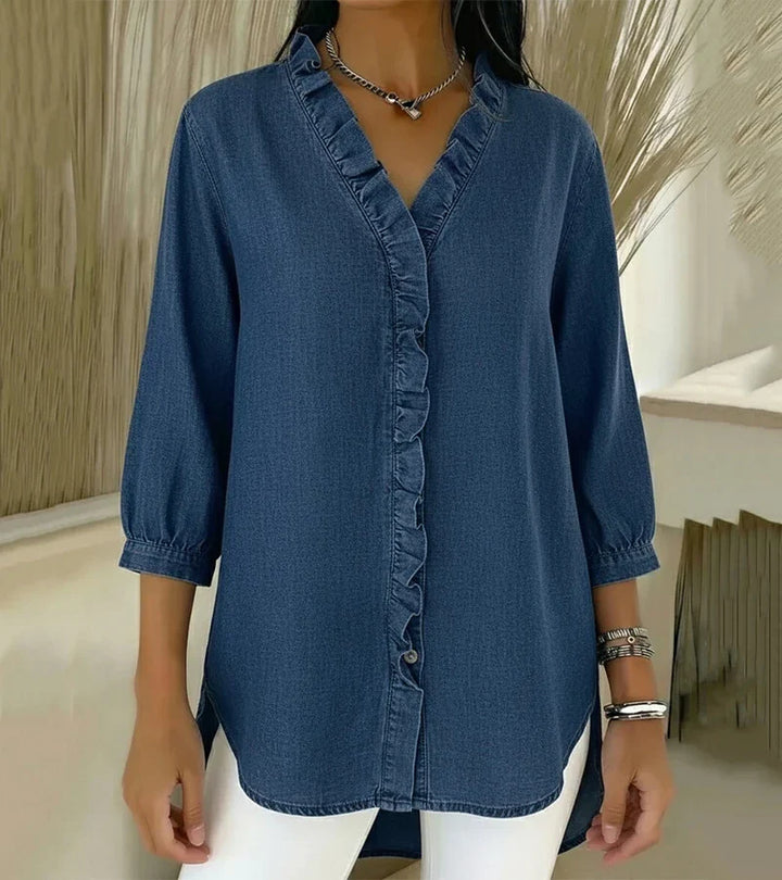 Blusa feminina fluida com decote V e volante, ideal para primavera/verão. Conforto e estilo casual.