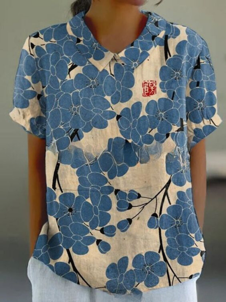 Camisa casual floral feminina, estampa vibrante. Confortável para o verão e primavera.