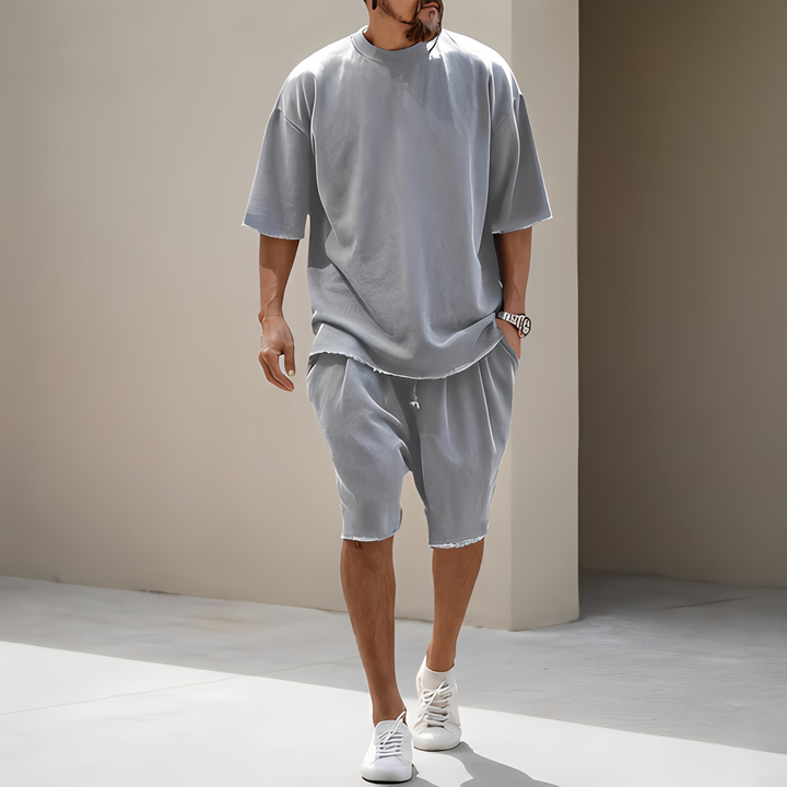 Detalhe do tecido do conjunto masculino oversize de verão, macio e confortável para dias quentes.
