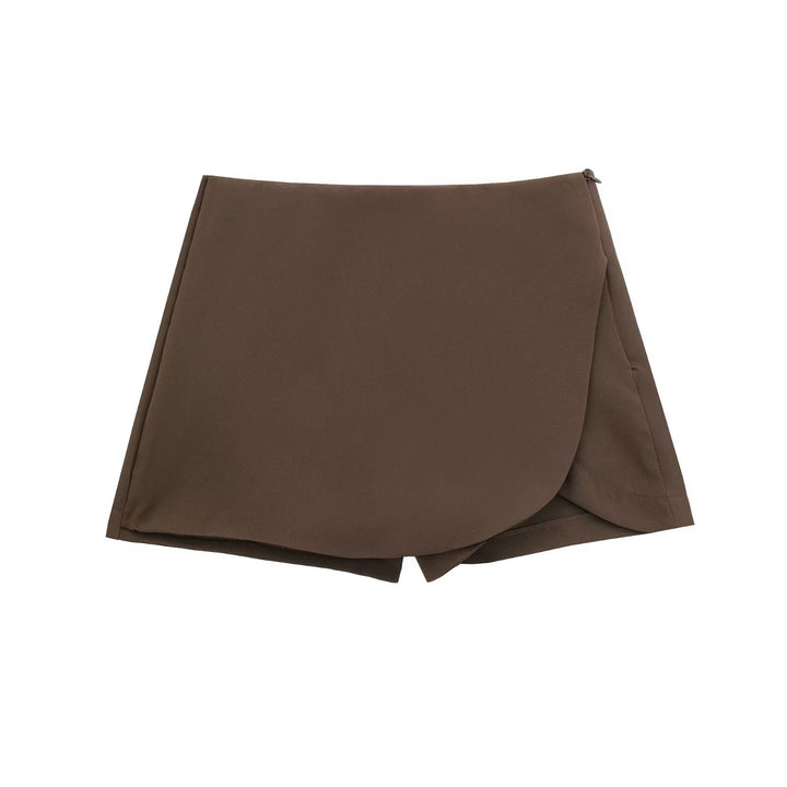 Saia Curta Feminina preta, versátil e elegante com calção integrado. Ideal para qualquer ocasião.
