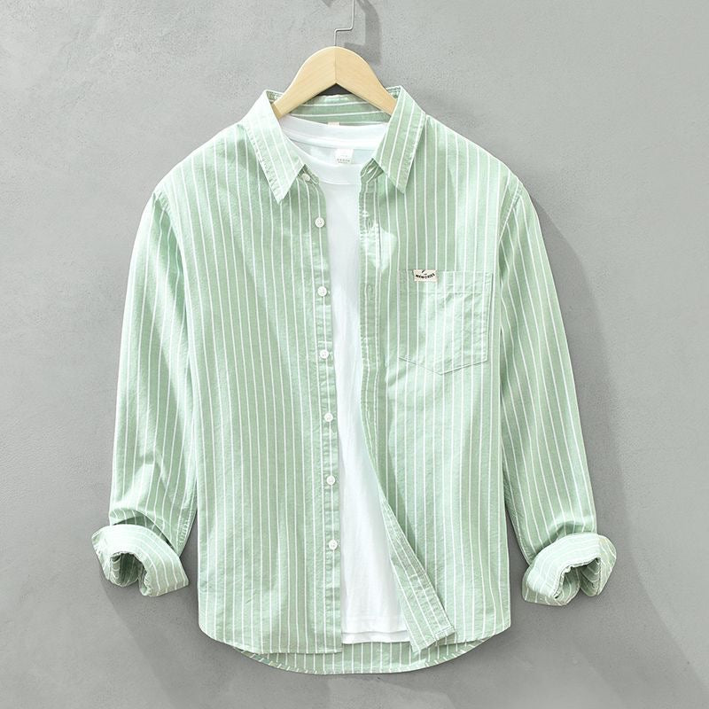 Top feminino listrado elegante para verão, moda praia e estilo casual, com conforto e leveza.