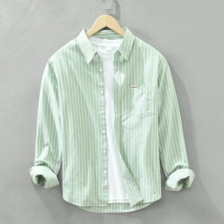 Top feminino listrado elegante para verão, moda praia e estilo casual, com conforto e leveza.
