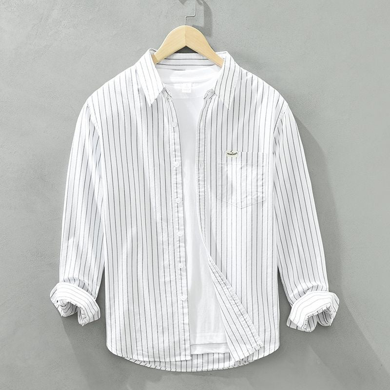 Blusa feminina listrada, ideal para o verão e praia. Estilo casual e elegante, com cores vibrantes.