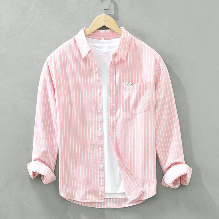 Top listrado feminino leve e confortável, ótimo para looks de verão, praia ou casual chique.