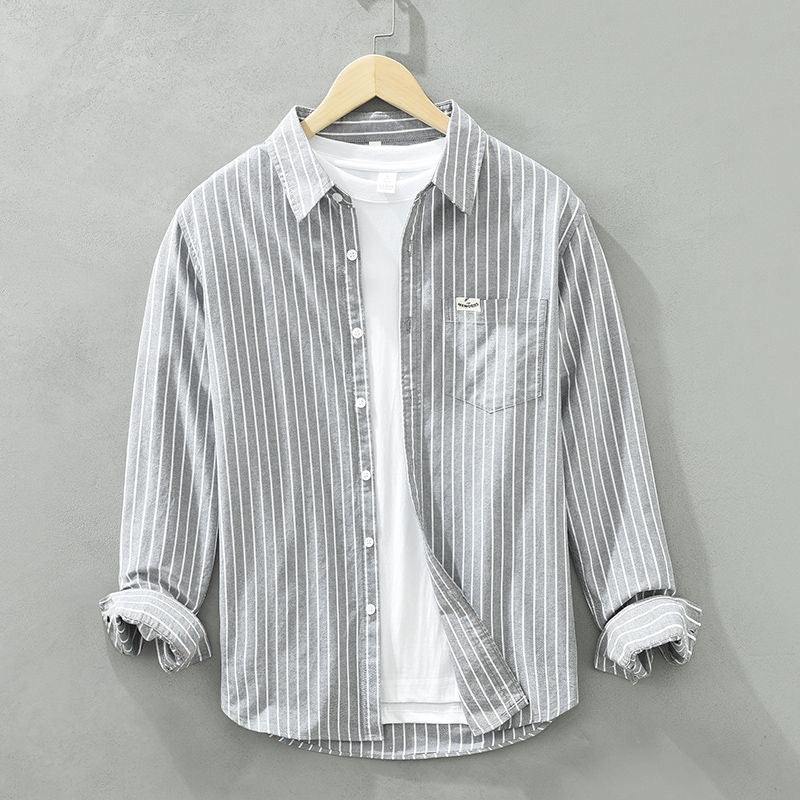 Top feminino listrado para verão, essencial na moda praia. Confortável, leve e com estilo casual elegante.