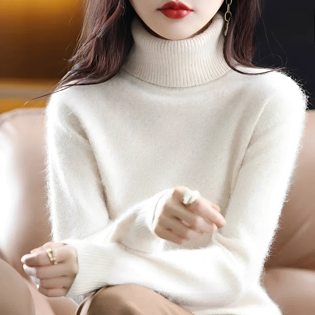 Roupa feminina de inverno: suéter gola alta macio, combinando elegância e conforto.