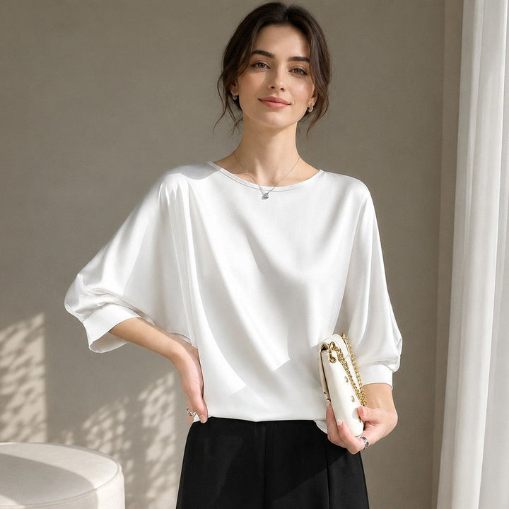 Blusa feminina elegante de verão, caimento solto para máximo conforto e estilo casual chic. Roupa feminina versátil.