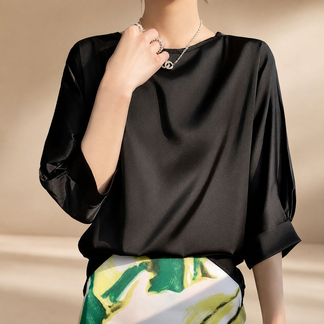 Top feminino elegante de caimento solto, confortável e versátil para todas as ocasiões. Blusa para moda verão casual.