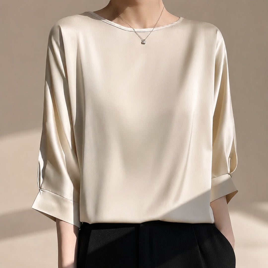 Blusa feminina elegante, caimento solto confortável. Top versátil para verão, moda casual e chique. Roupa feminina.