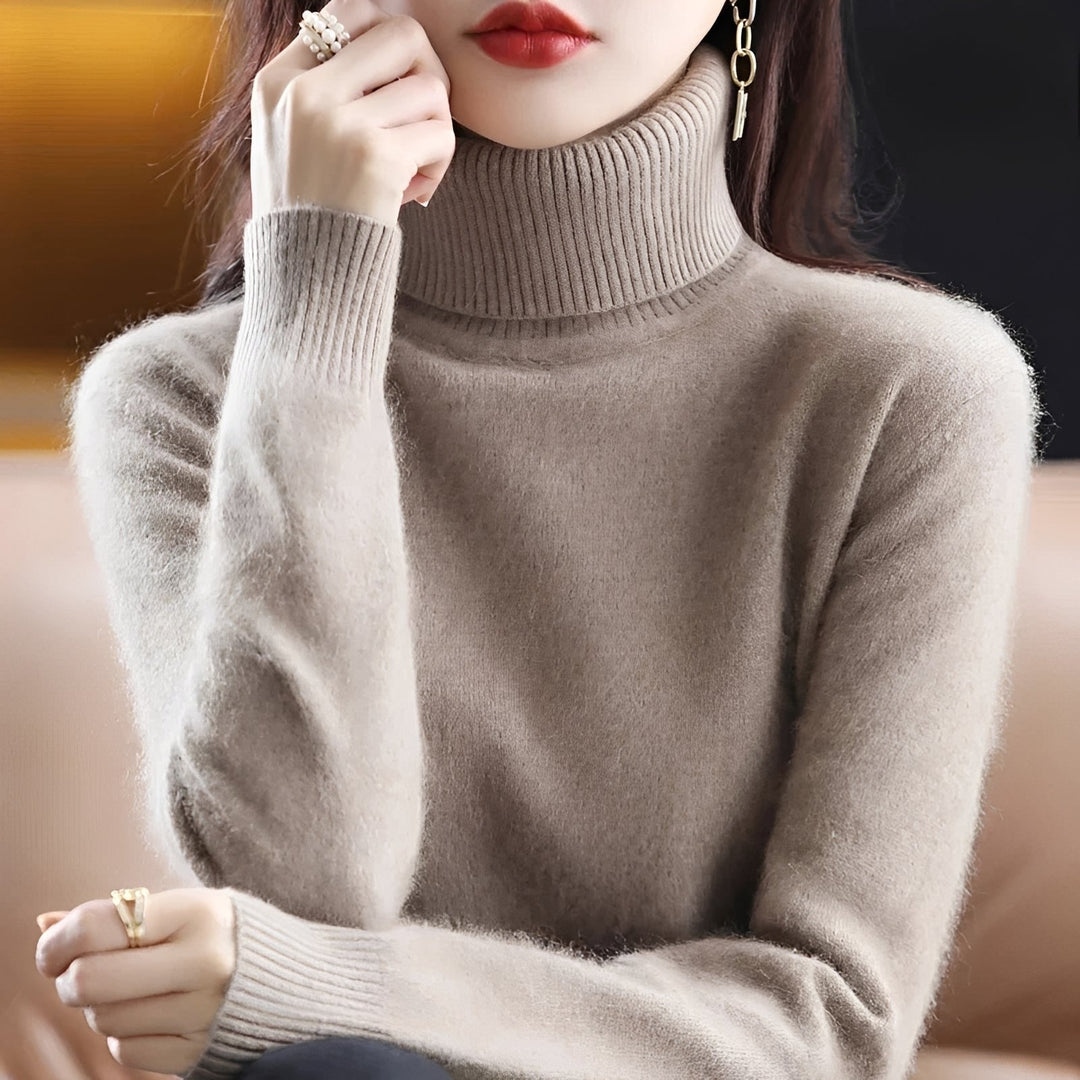 Suéter feminino gola alta elegante para o inverno, perfeito para conforto e estilo.