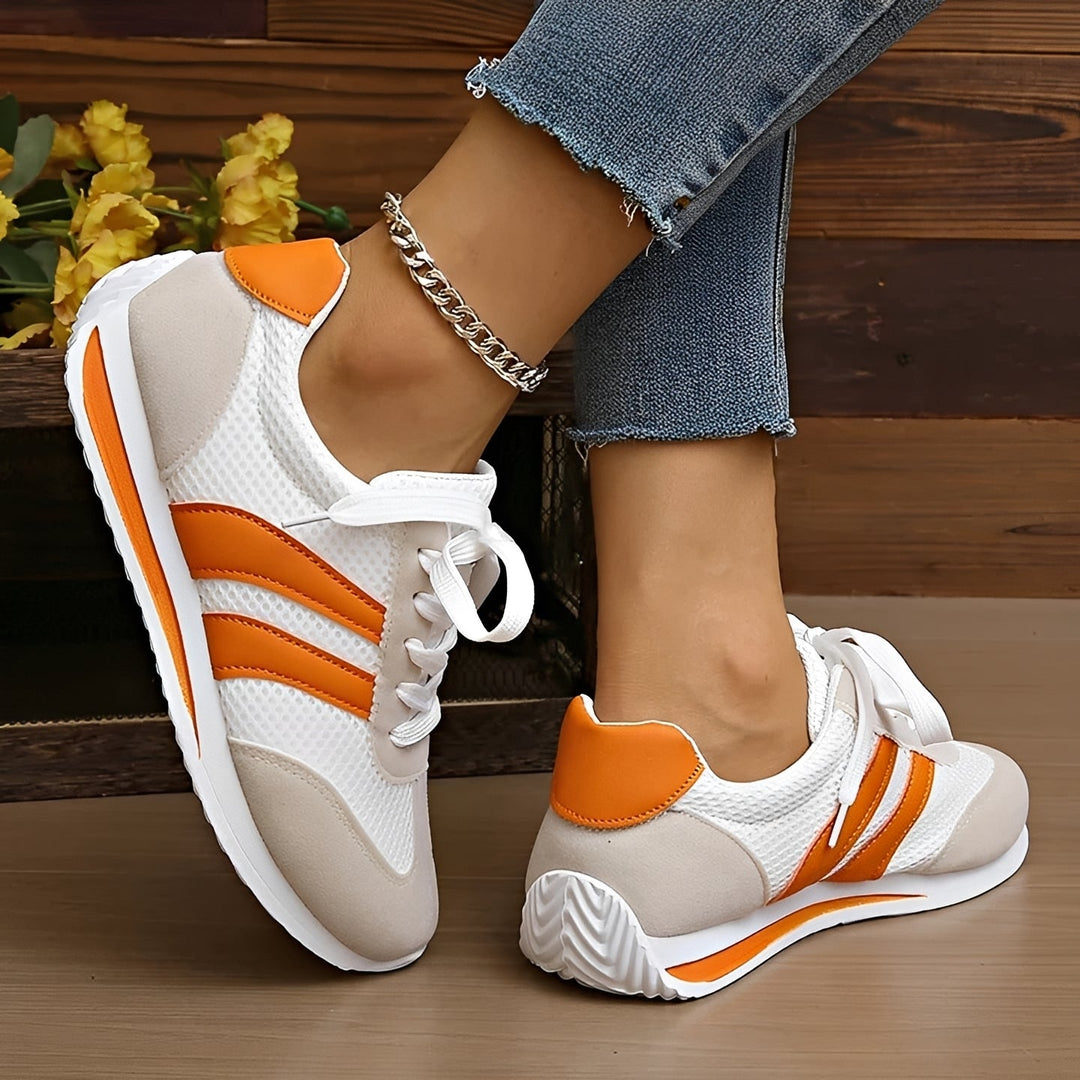 Tênis feminino respirável e estiloso, ideal para o dia a dia e caminhada, com design moderno e conforto duradouro.