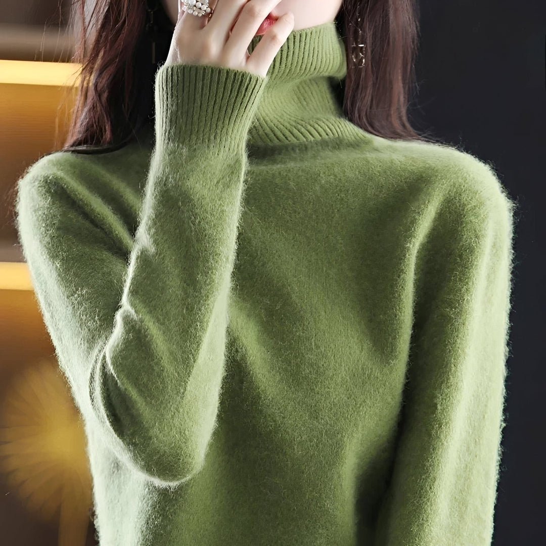 Moda feminina chic: suéter pullover gola alta para conforto e elegância no inverno.
