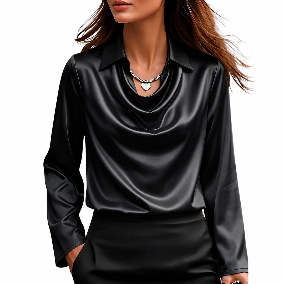 Blusa feminina de brilho sutil, manga comprida, com corte elegante para um visual casual chic ou de trabalho sofisticado.