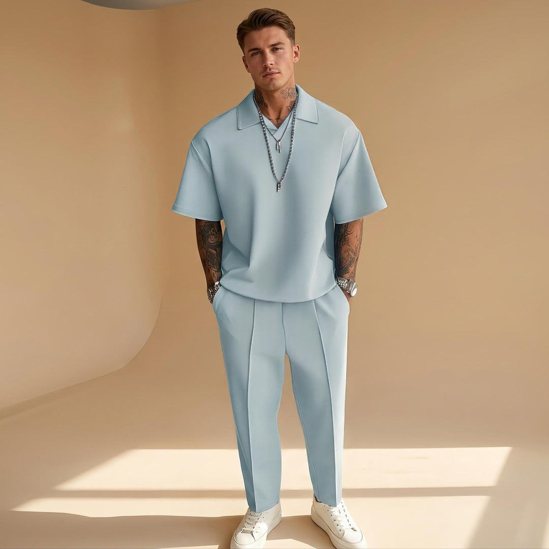 Conjunto masculino oversized casual de 2 peças em tecido leve, perfeito para o verão e conforto com estilo.
