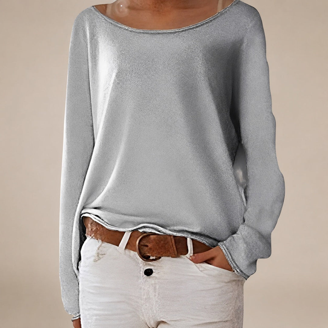 Suéter feminino elegante ombro a ombro de malha leve. Ideal para outono/inverno, estilo casual e confortável.