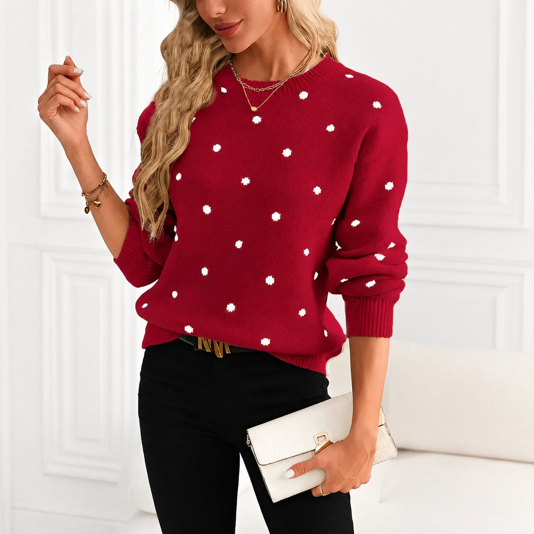 Suéter feminino com estampa de bolinhas, versátil para looks casuais ou elegantes. Moda feminina de inverno.