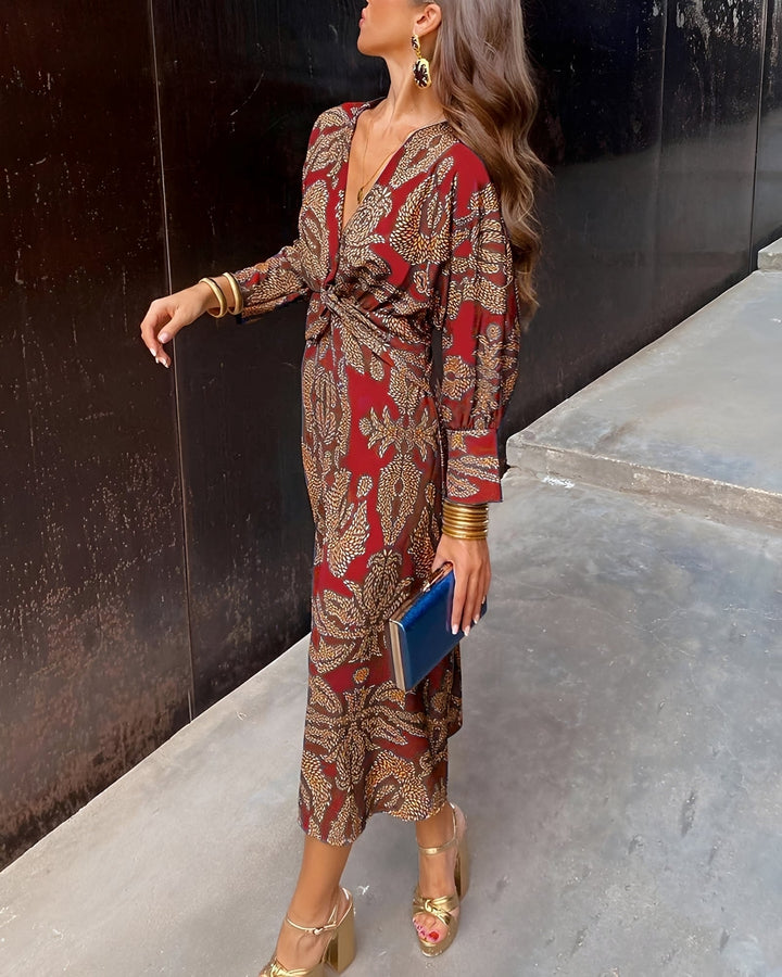 Vestido feminino estampado midi fluido e confortável, peça essencial para um visual elegante de verão.