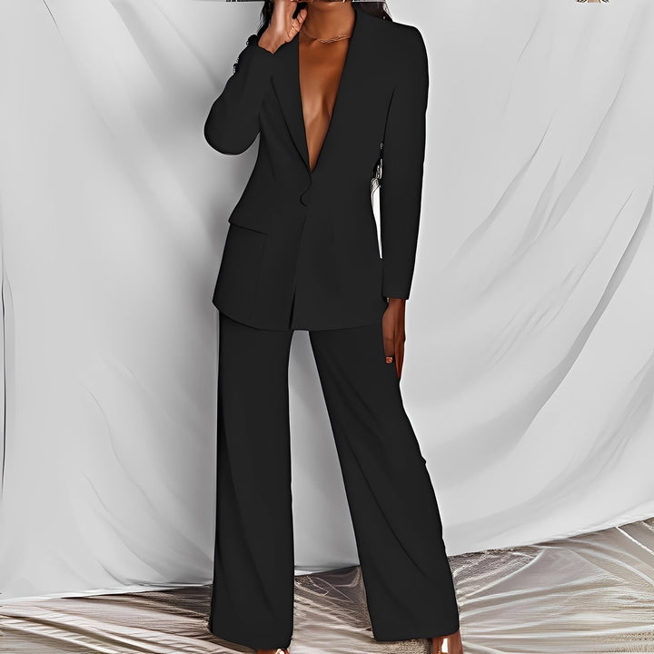 Blazer feminino e calça elegante, conjunto de vestuário formal para o trabalho e eventos sociais.