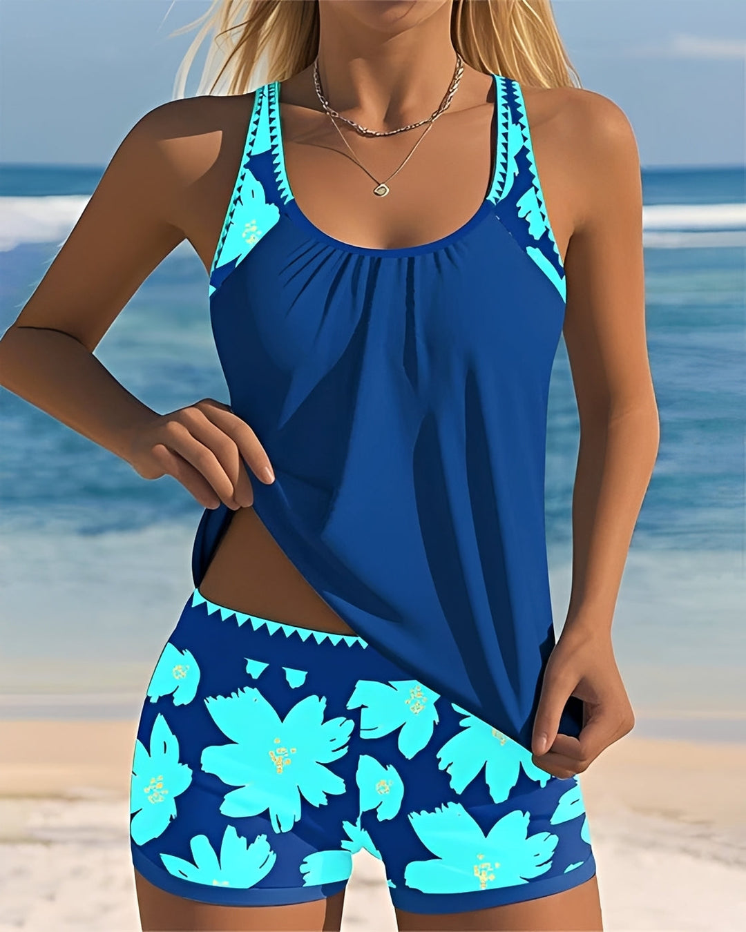 Tankini feminino floral com decote em U, perfeito para moda praia de verão e piscina. Conforto e estilo nas suas férias.