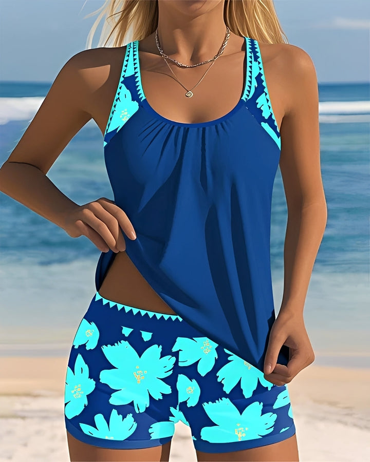Tankini feminino floral com decote em U, perfeito para moda praia de verão e piscina. Conforto e estilo nas suas férias.