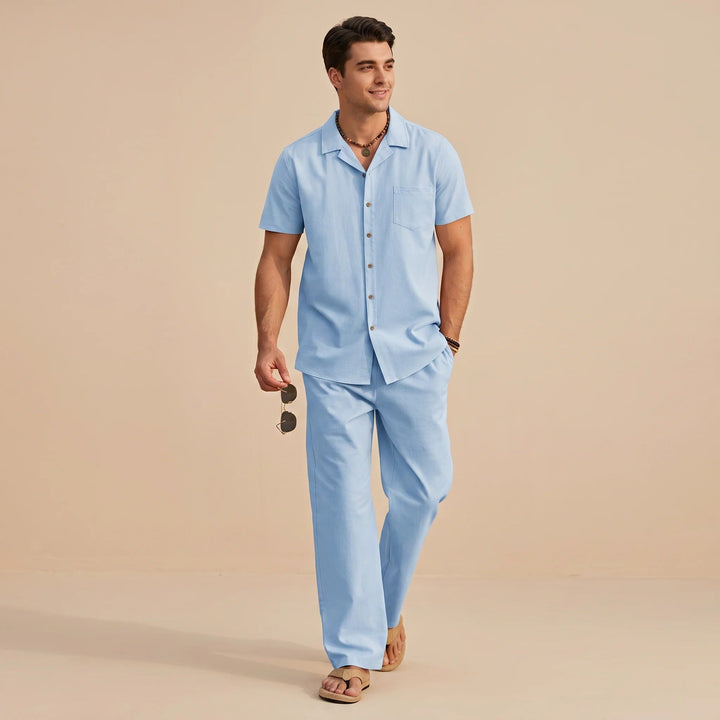 Conjunto masculino relaxado para verão: camisa e calça casual, ideal para férias e moda praia.