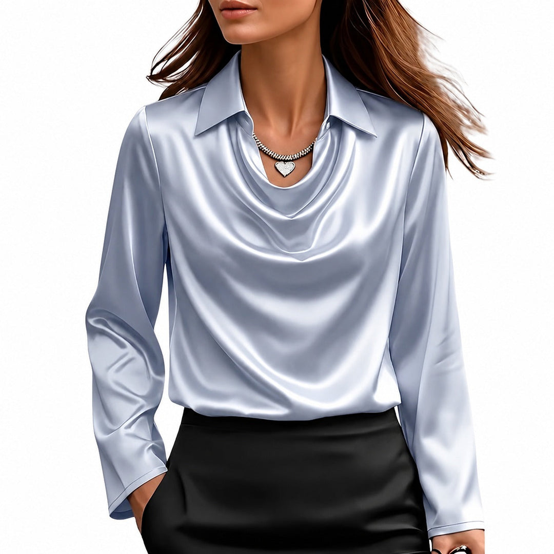 Blusa feminina elegante de manga comprida com brilho, ideal para outono e inverno. Versátil para festas e escritório.