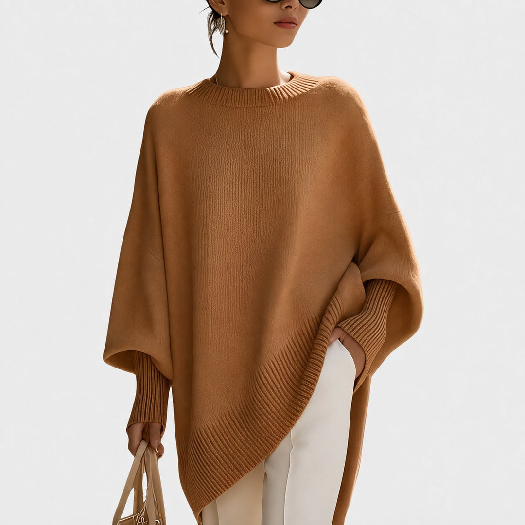 Suéter pulôver feminino com caimento oversize, confortável para moda inverno casual e estilosa.