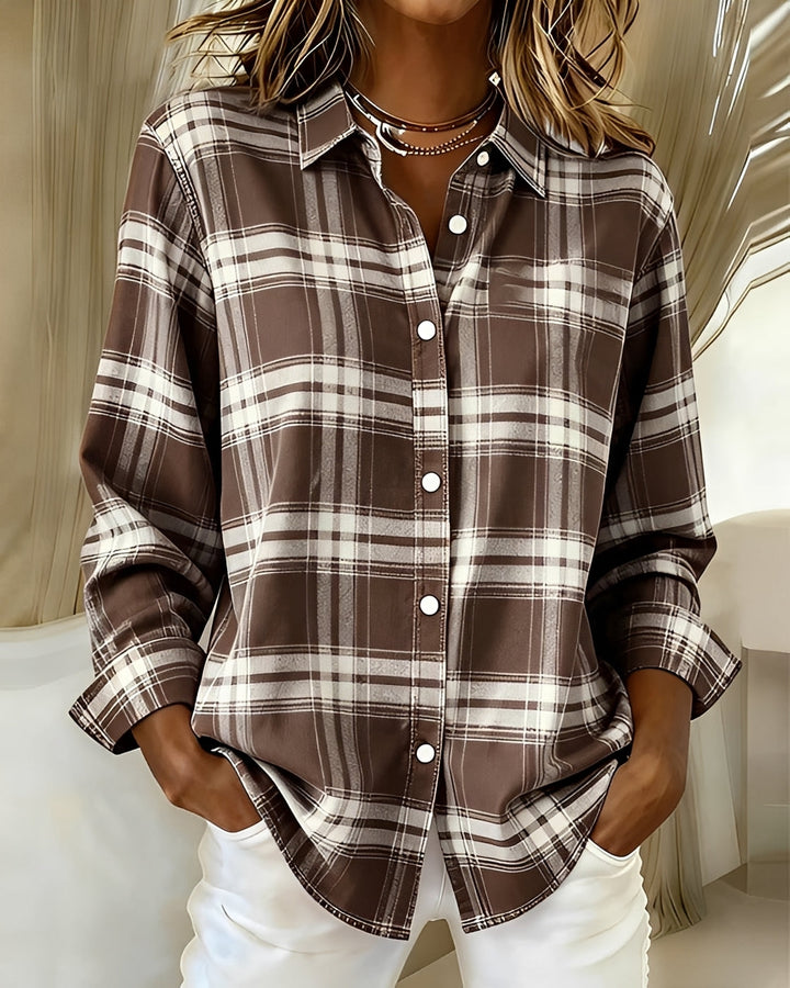 Blusa feminina xadrez de manga longa, estampa clássica e confortável. Ideal para looks casuais de moda feminina.