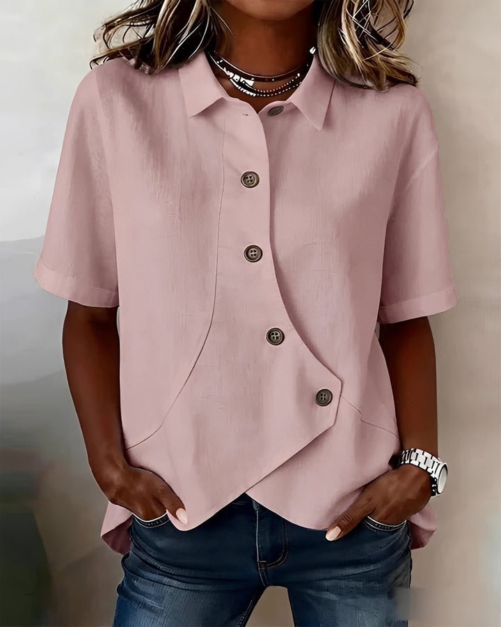 Blusa de verão feminina assimétrica, com botões decorativos. Moda casual moderna e confortável.
