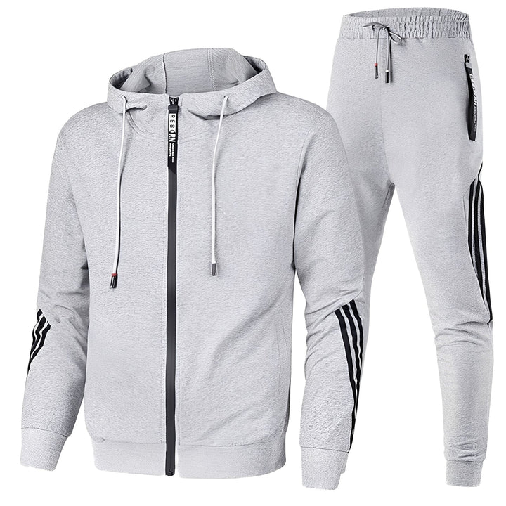 Fato de treino masculino elegante, conjunto versátil para moda casual e viagem.