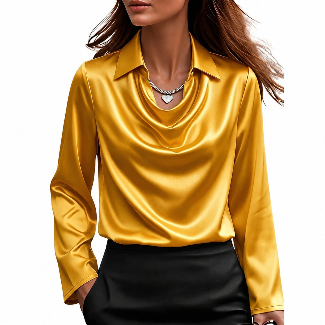 Blusa feminina versátil com brilho, manga comprida, ideal para looks de festa, trabalho ou casual chic e eventos sociais.