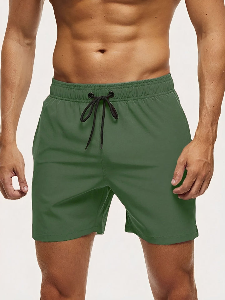 Calções masculinos casuais de secagem rápida, perfeitos para um dia relaxante na praia ou à beira da piscina.