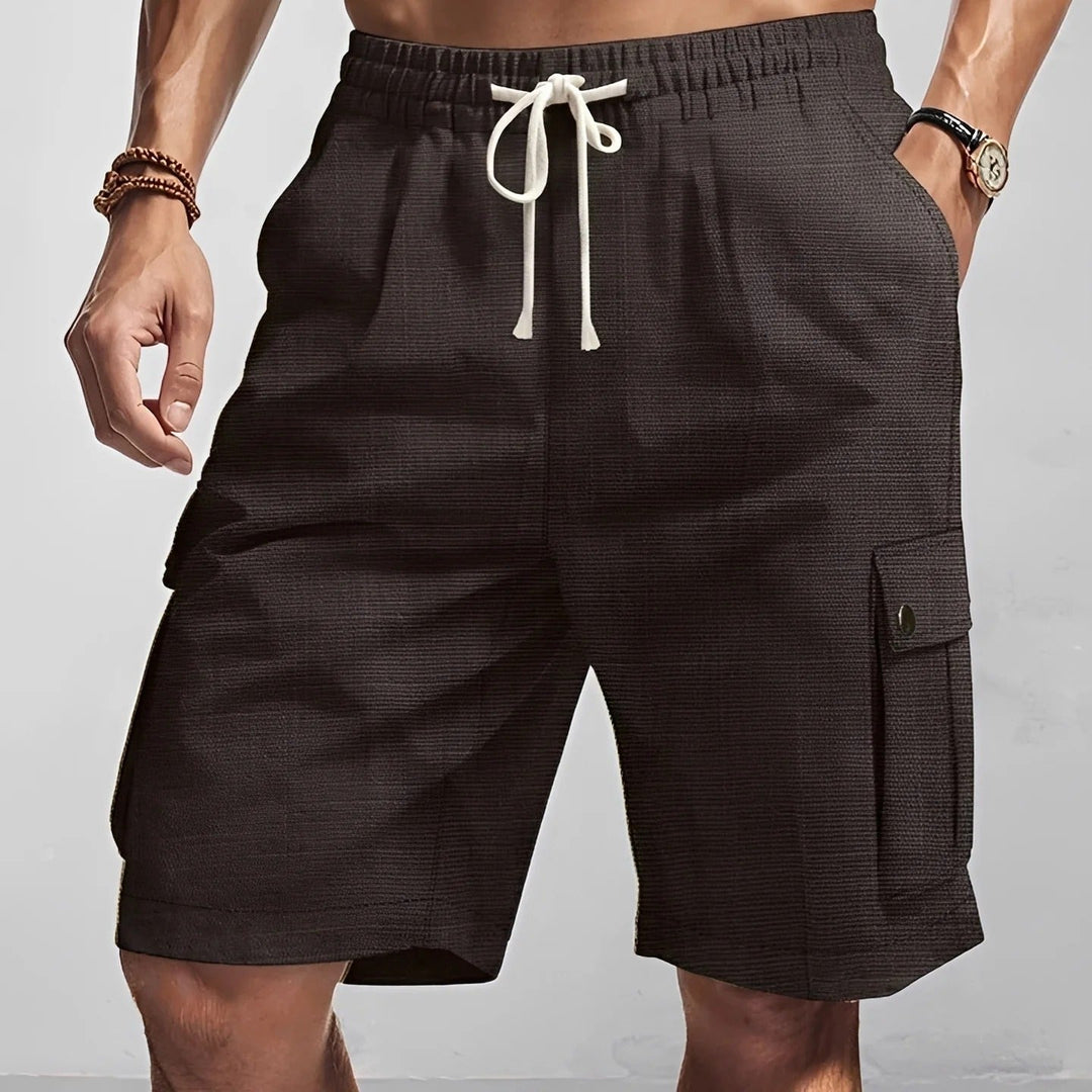 Calções cargo masculinos casuais e versáteis. Conforto e estilo para o verão, viagens ou dia a dia.