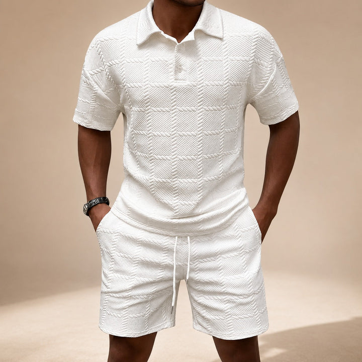 Conjunto masculino texturizado azul-marinho para verão, estilo casual chic e confortável.