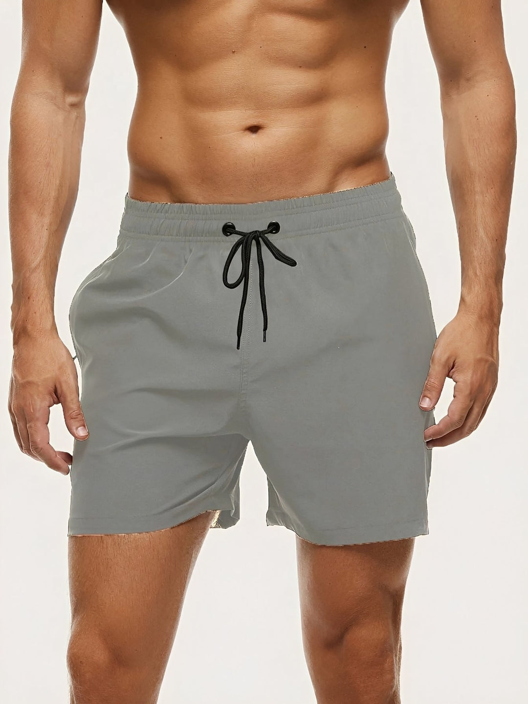 Essenciais calções de banho masculinos para o verão. Secagem rápida e conforto para dias na praia ou piscina.